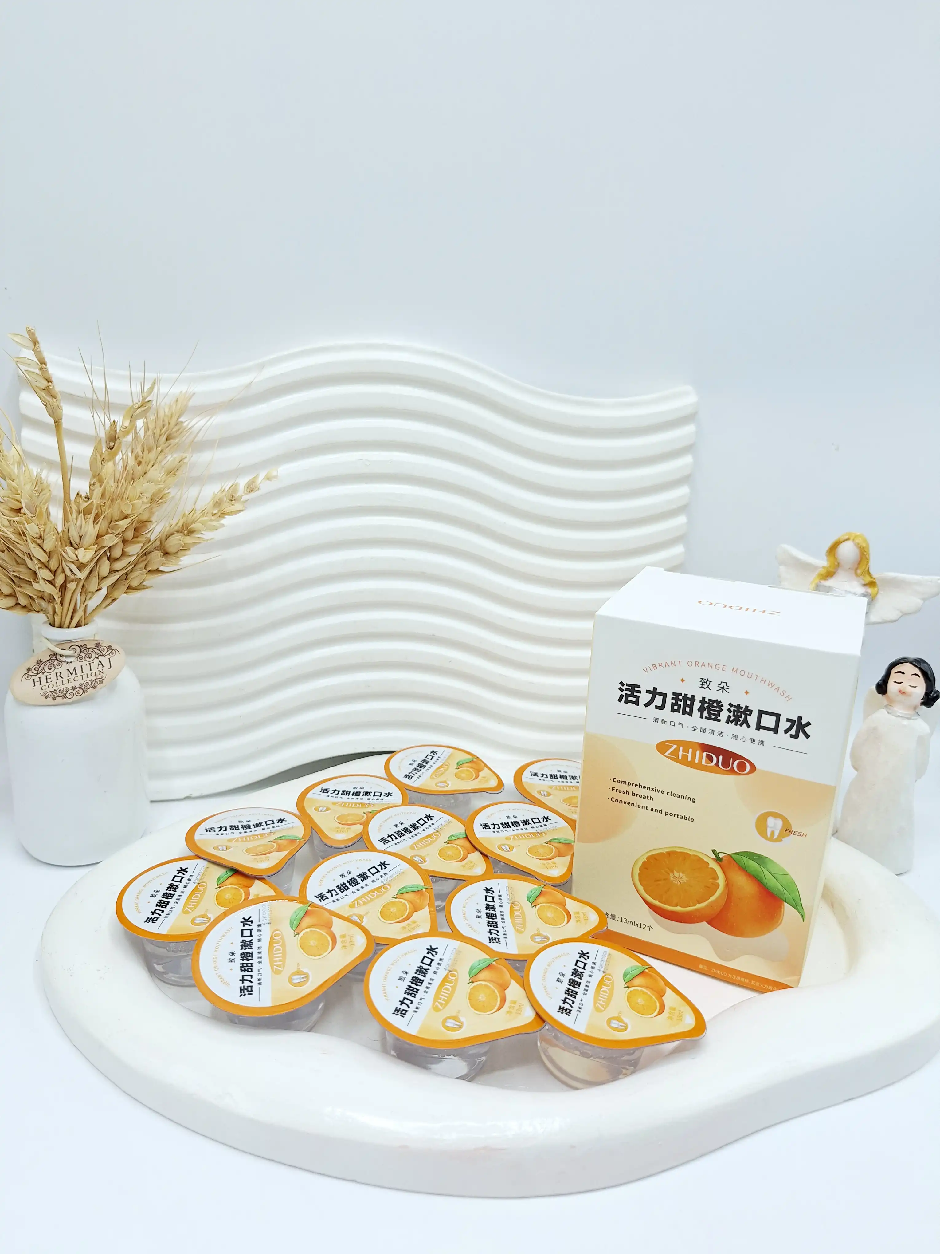 پک 12 تایی دهانشویه طراوت بخش پرتقال ZHIDUO کد 3428